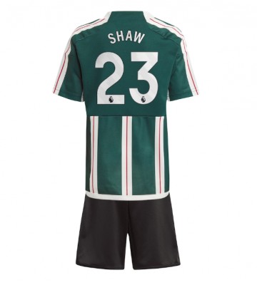 Maillot de foot Manchester United Luke Shaw #23 Extérieur enfant 2023-24 Manches Courte (+ pantalon court)
